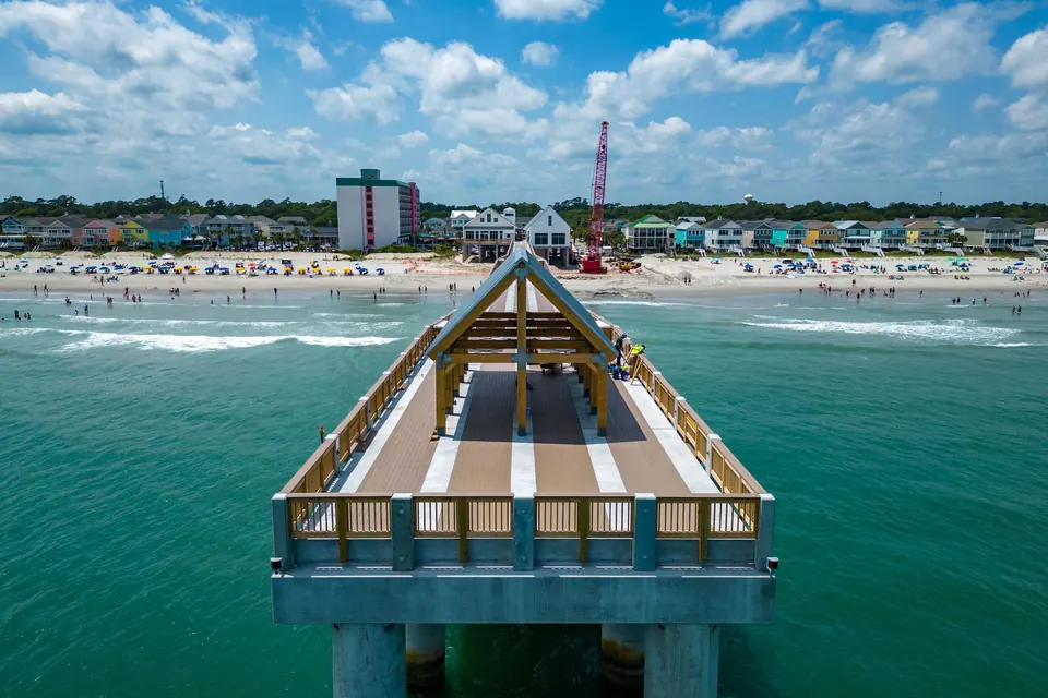 Aerial view of the pier at Surfside Beach, South Carolina, on a clear day
