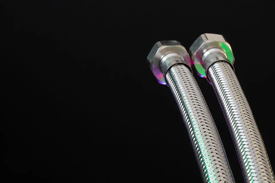 Two braided steel supply hoses